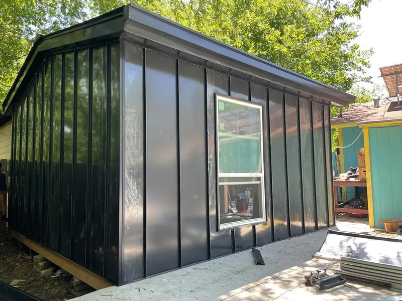 Black standing seam metal wall panels for Metal Roof Installation in DeBary