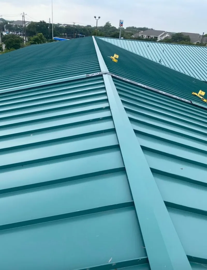 Green commercial metal roof ridge and valley for Metal Roof Repair in DeBary